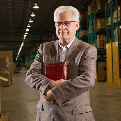 David Green, Hobby Lobby CEO, David Green with Bible in warehouse, Culture Wars, Abortifacients, Obamacare, Affordable Care Act
